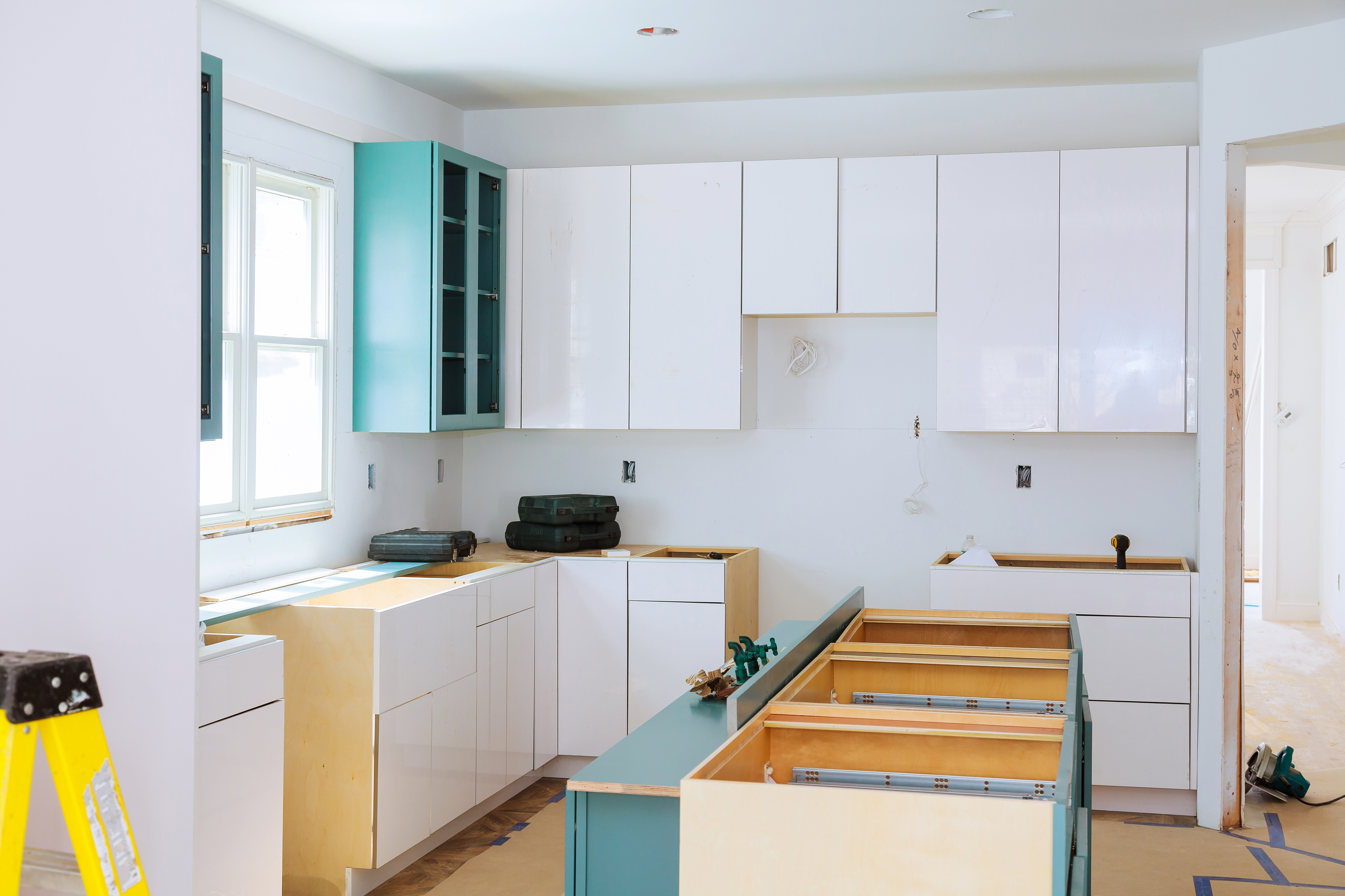 A condo kitchen in the process of remodeling | Source: Getty Images