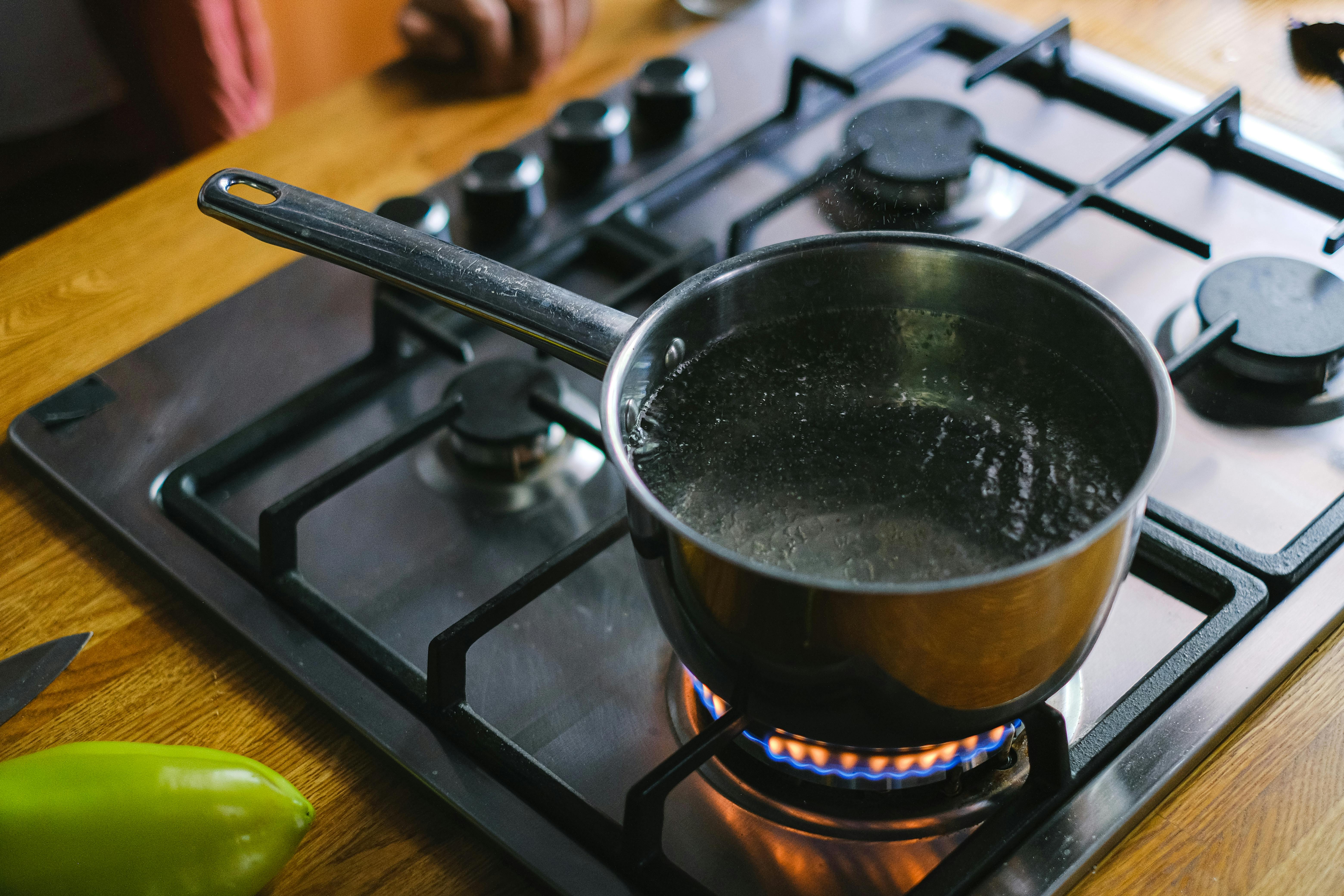Boiling water in a pot | Source: Pexels