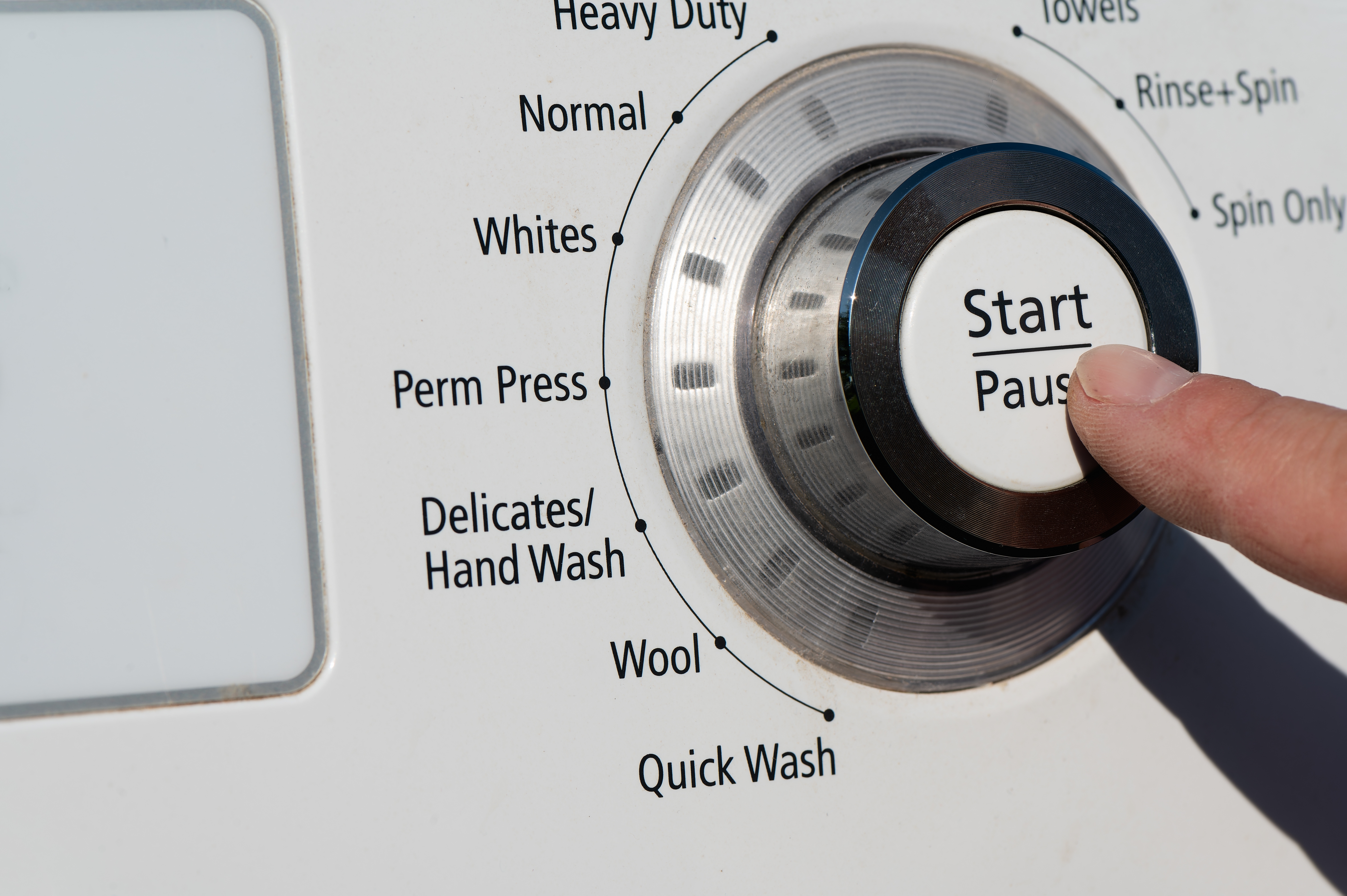 If your machine doesn't have a gentle cycle, use the delicate setting or choose hand wash instead. | Source: Shutterstock