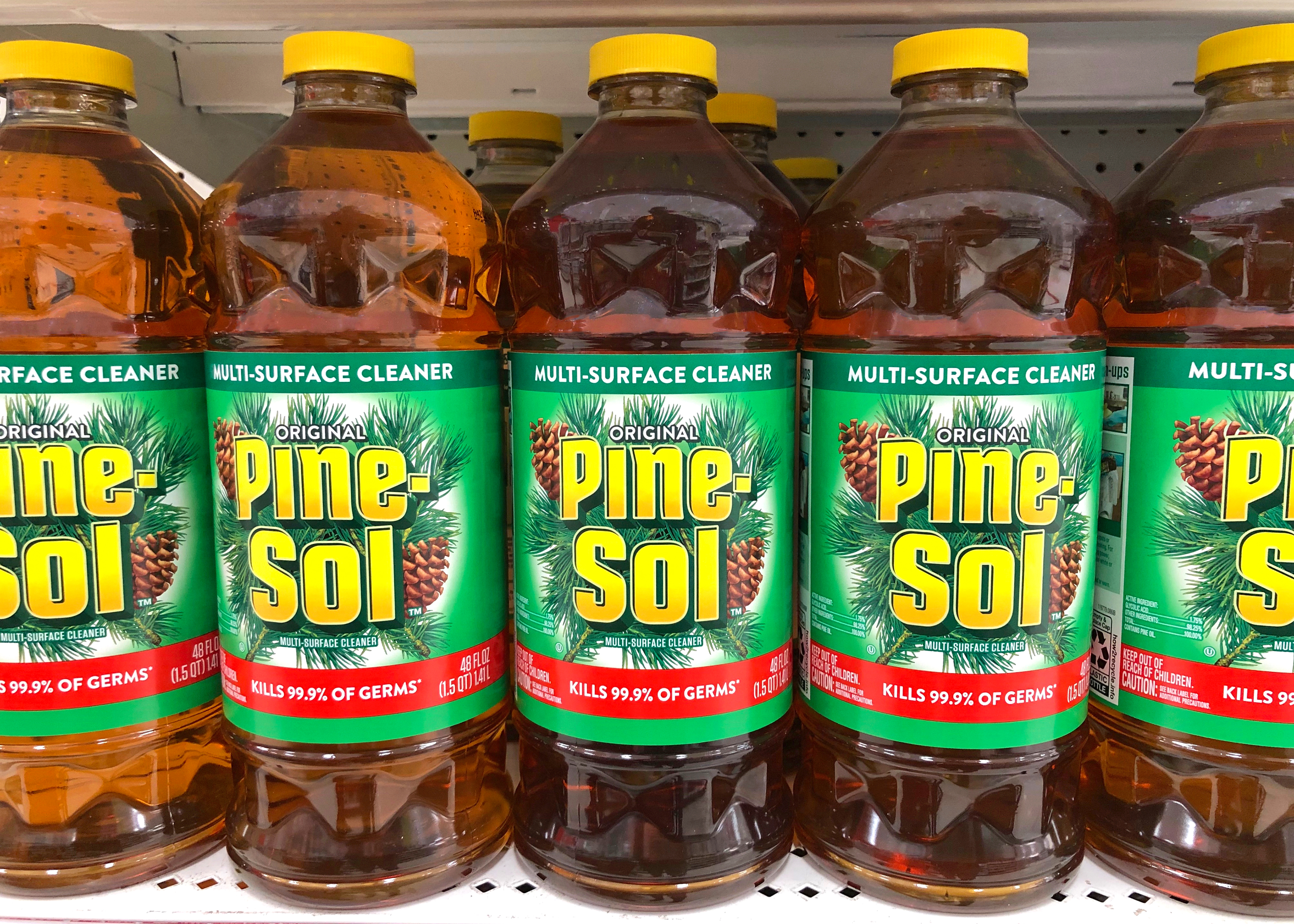 Pine-Sol multi-surface cleaner bottles on store shelves | Source: Shutterstock