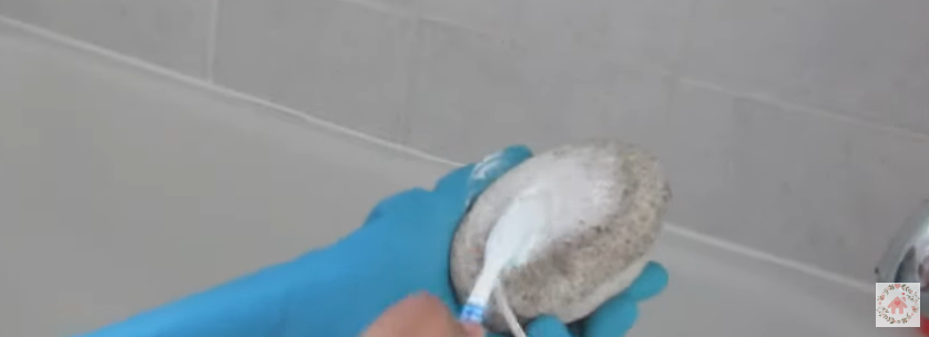 Gently scrub your pumice stone | Source: YouTube/Journey to Home Sweet Home