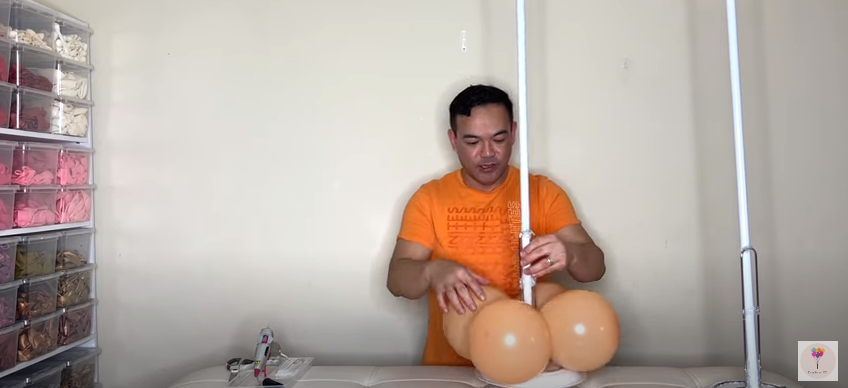 A complete DIY balloon column stand | Source: YouTube/fambamny/videos