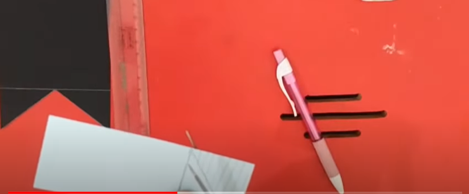 A white paper being trimmed | Source: YouTube/@hinalscreation1310