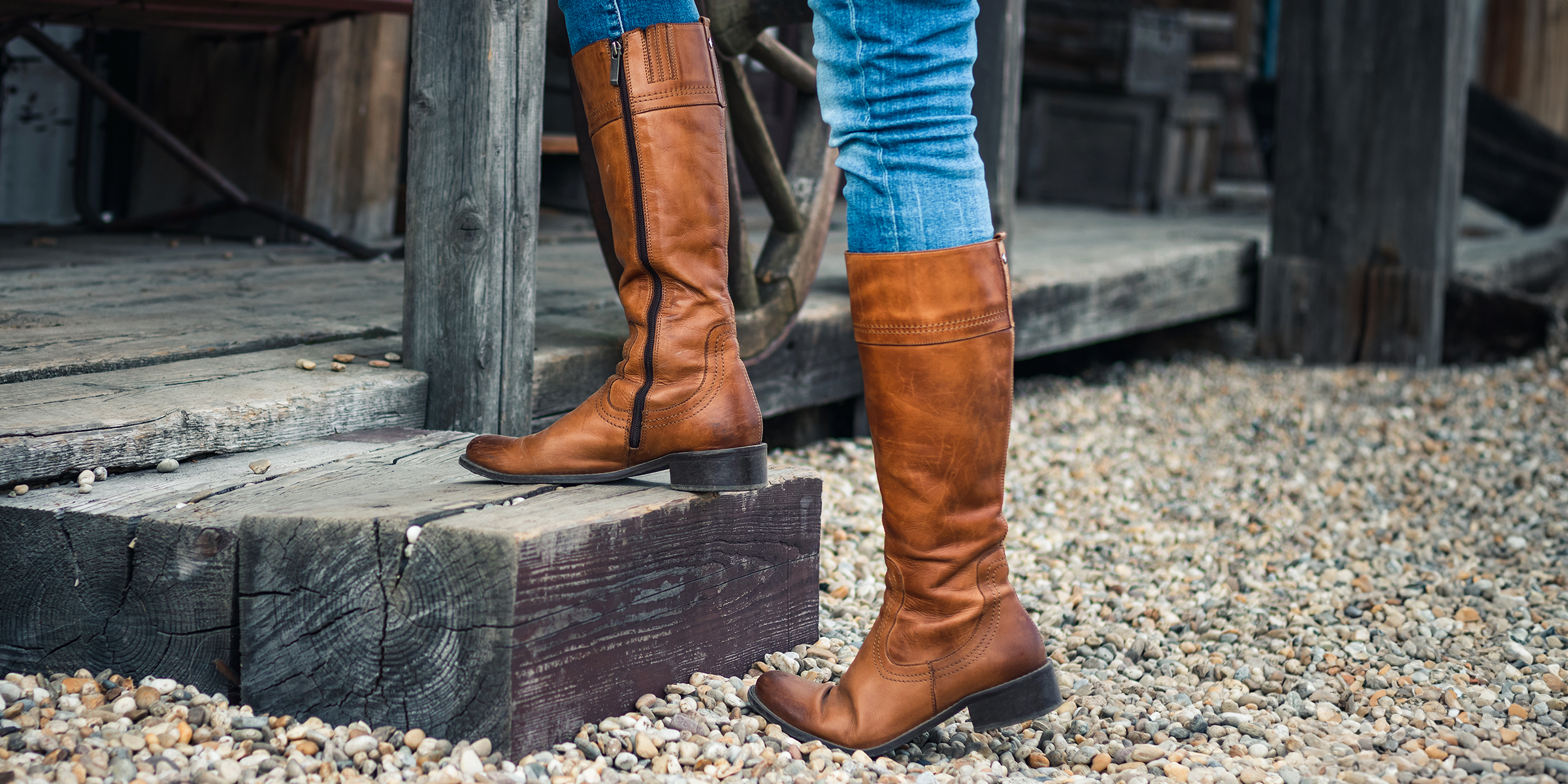 Brown calf-high boots | Source: Shutterstock