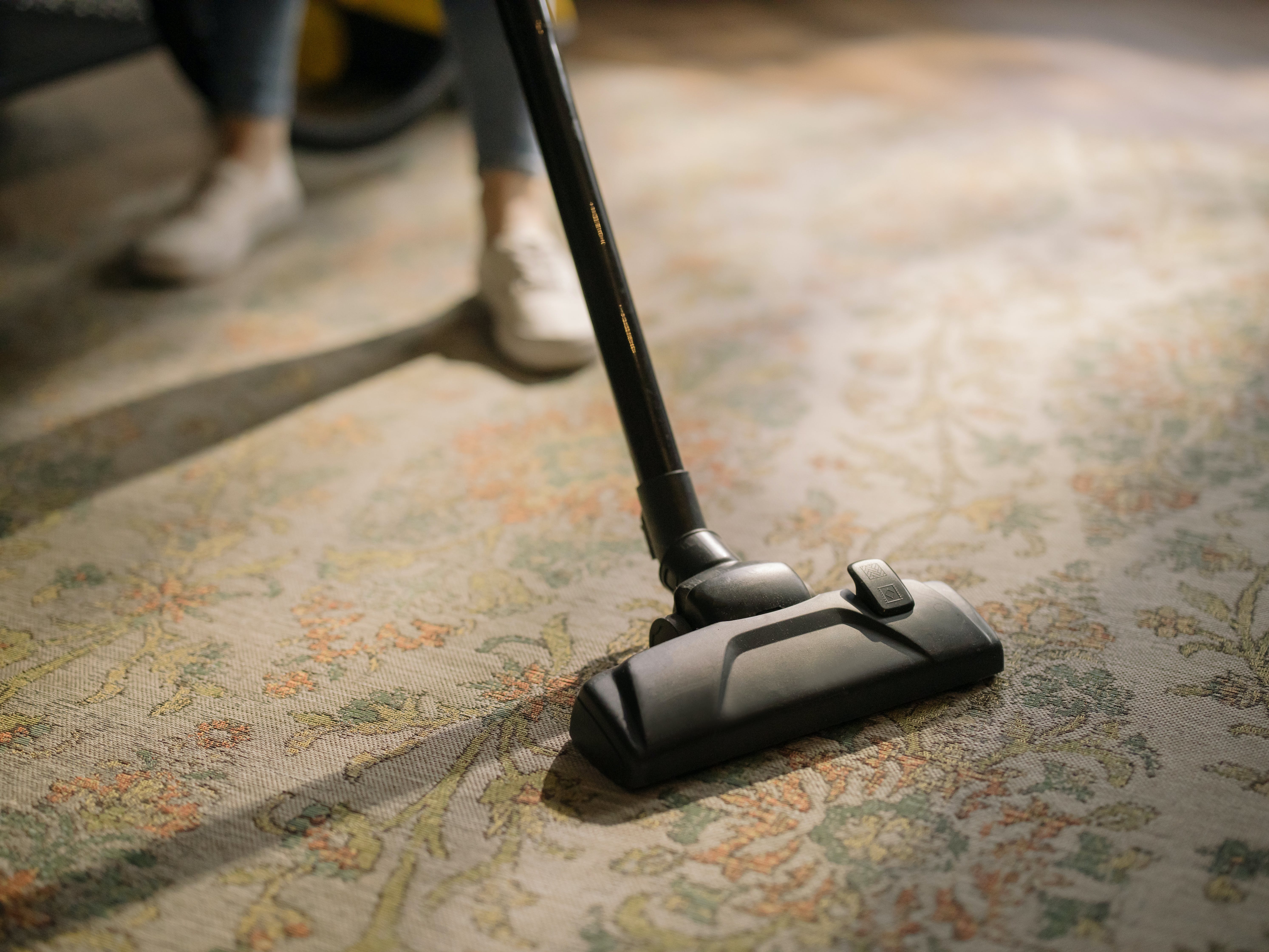 Vacuum the carpet to eliminate any remaining debris, and repeat as necessary. |  Source: Pexels