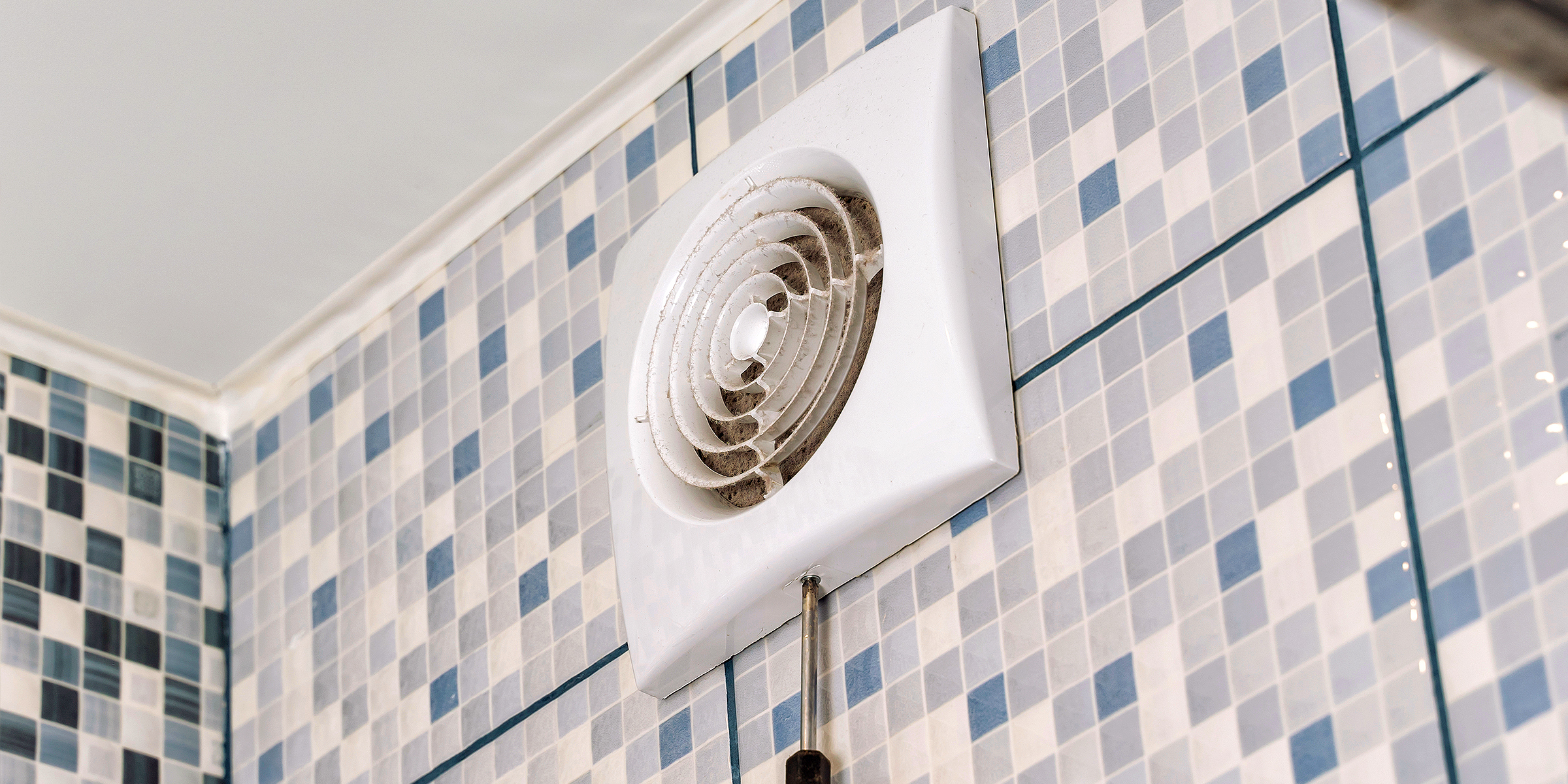 A dirty bathroom exhaust fan | Source: Shutterstock
