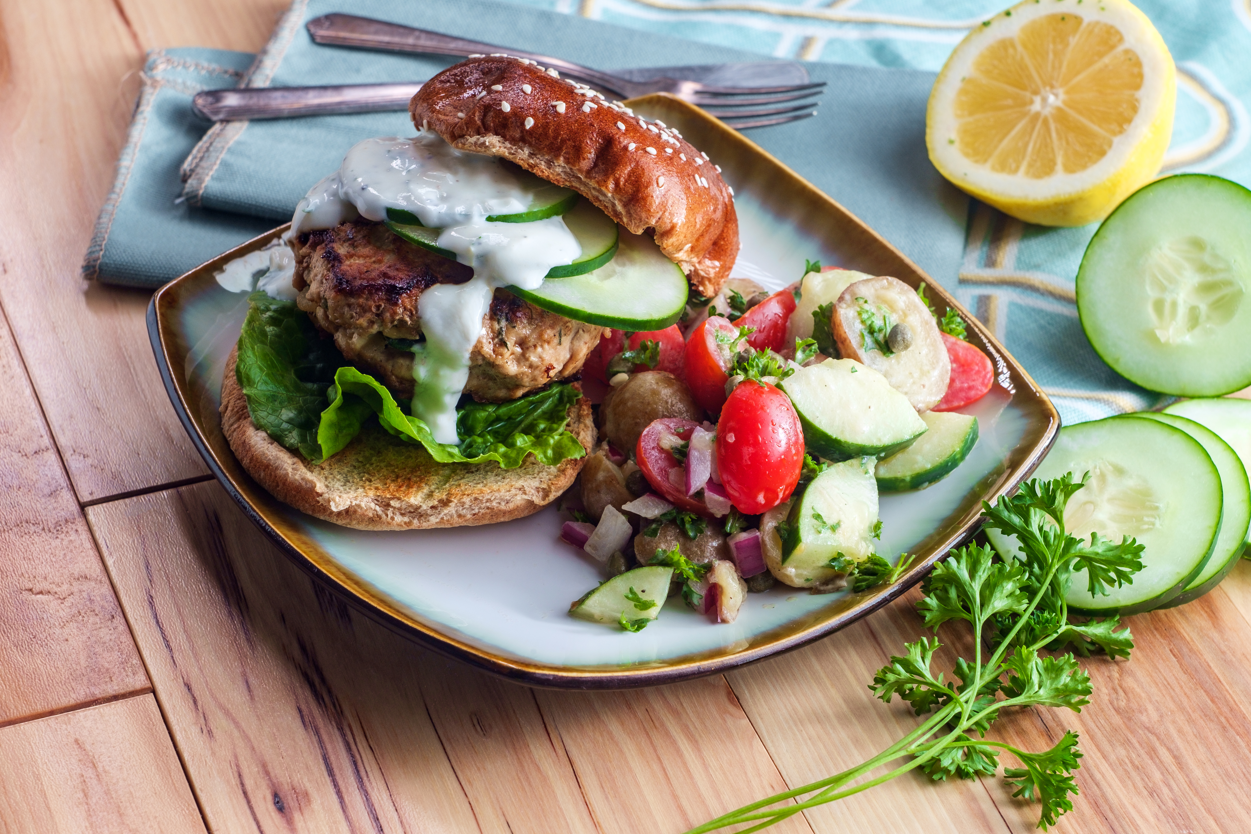 A turkey burger served with salad | Source: Shutterstock