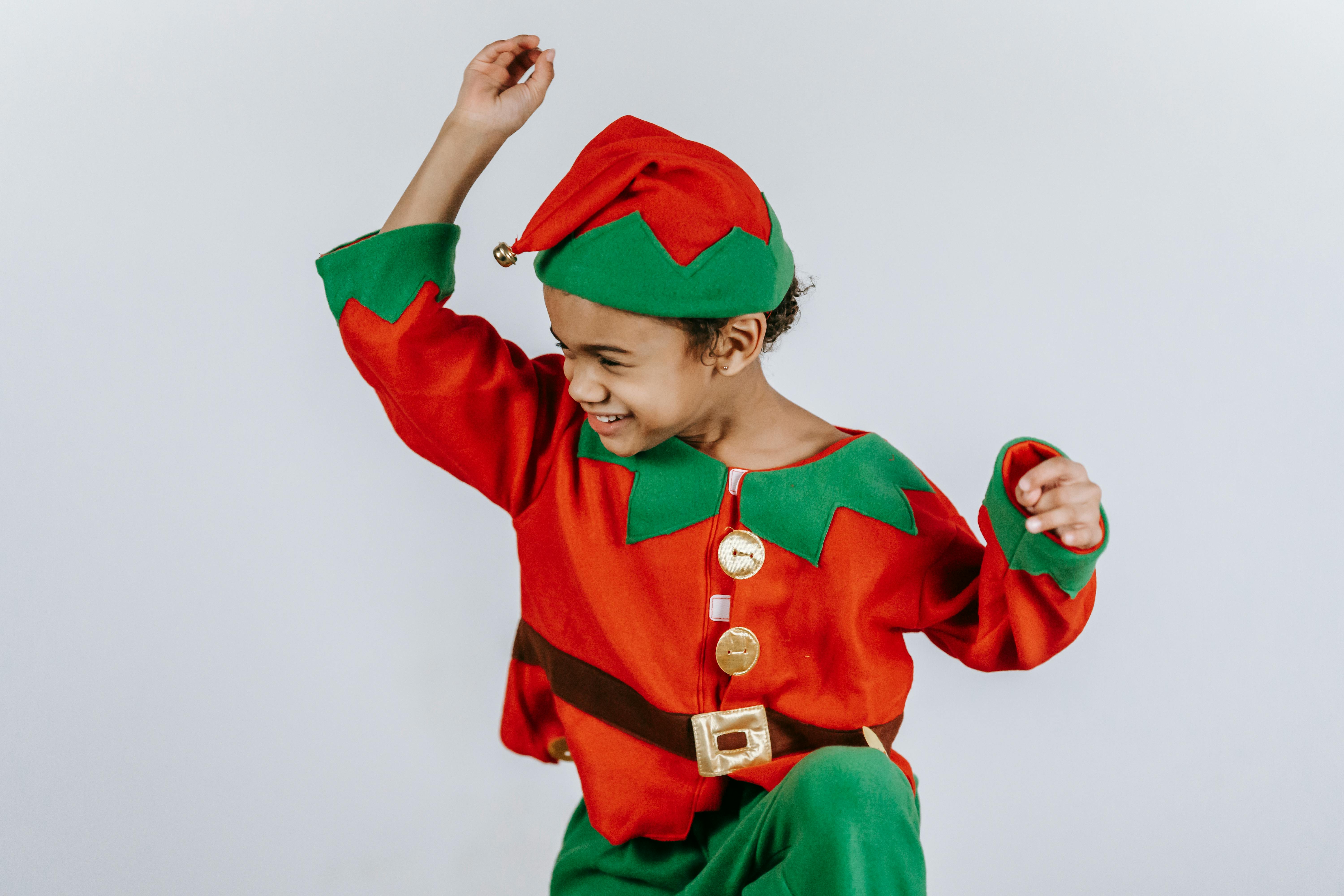 A happy boy wearing an elf costume | Source: Pexels