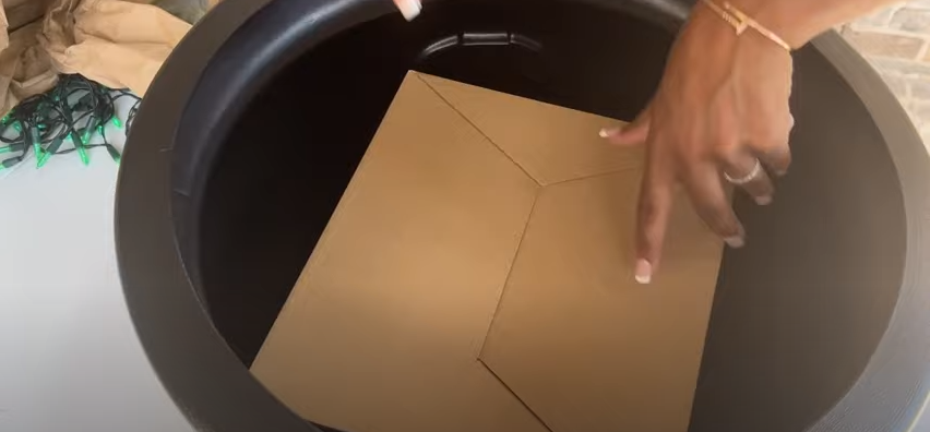 Use a carton box based on the size of your cauldron | Source: YouTube/@JustJeannieJ