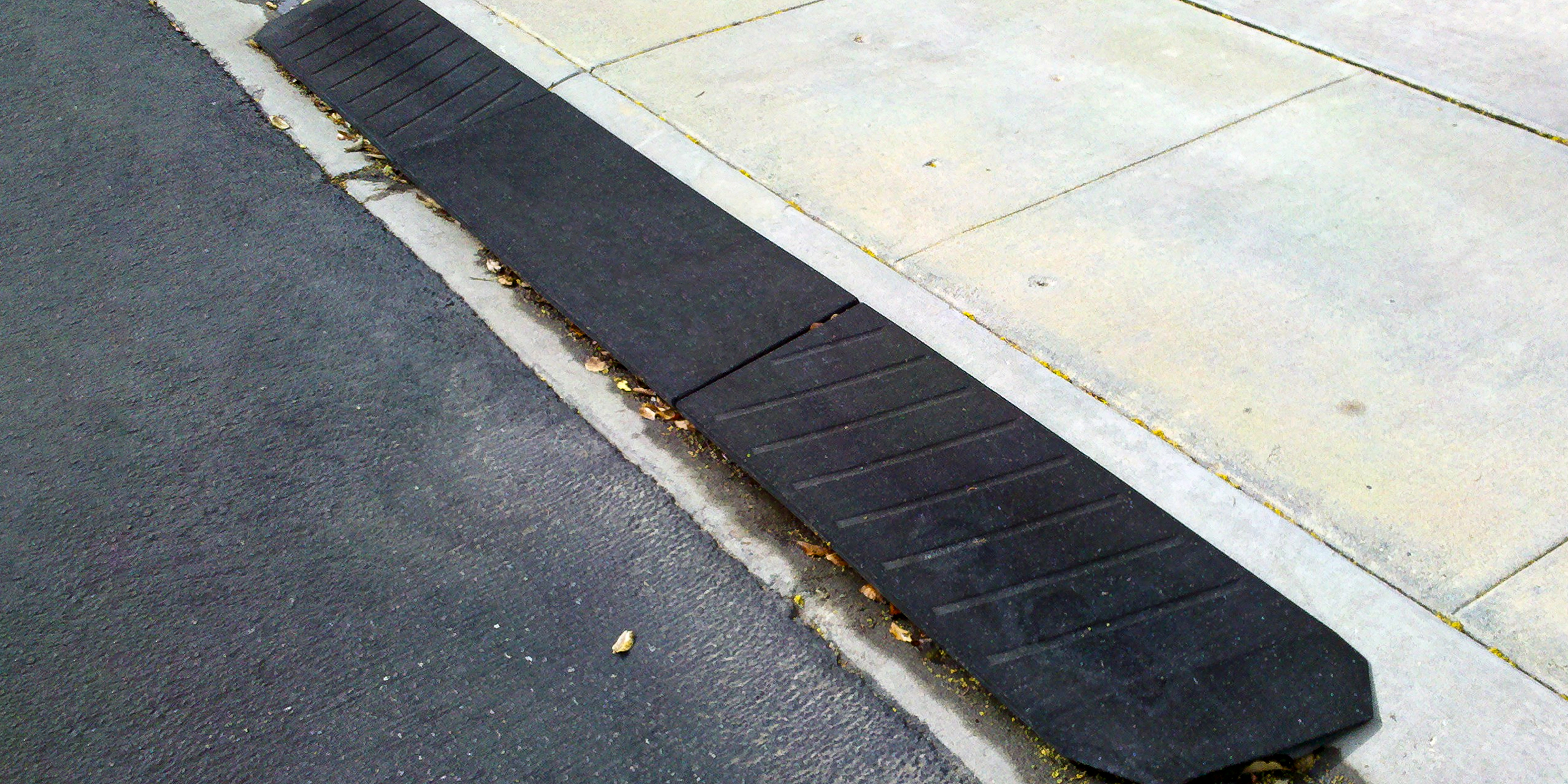A rubber curb ramp | Source: Flickr/Howard O. Young/CC BY 2.0