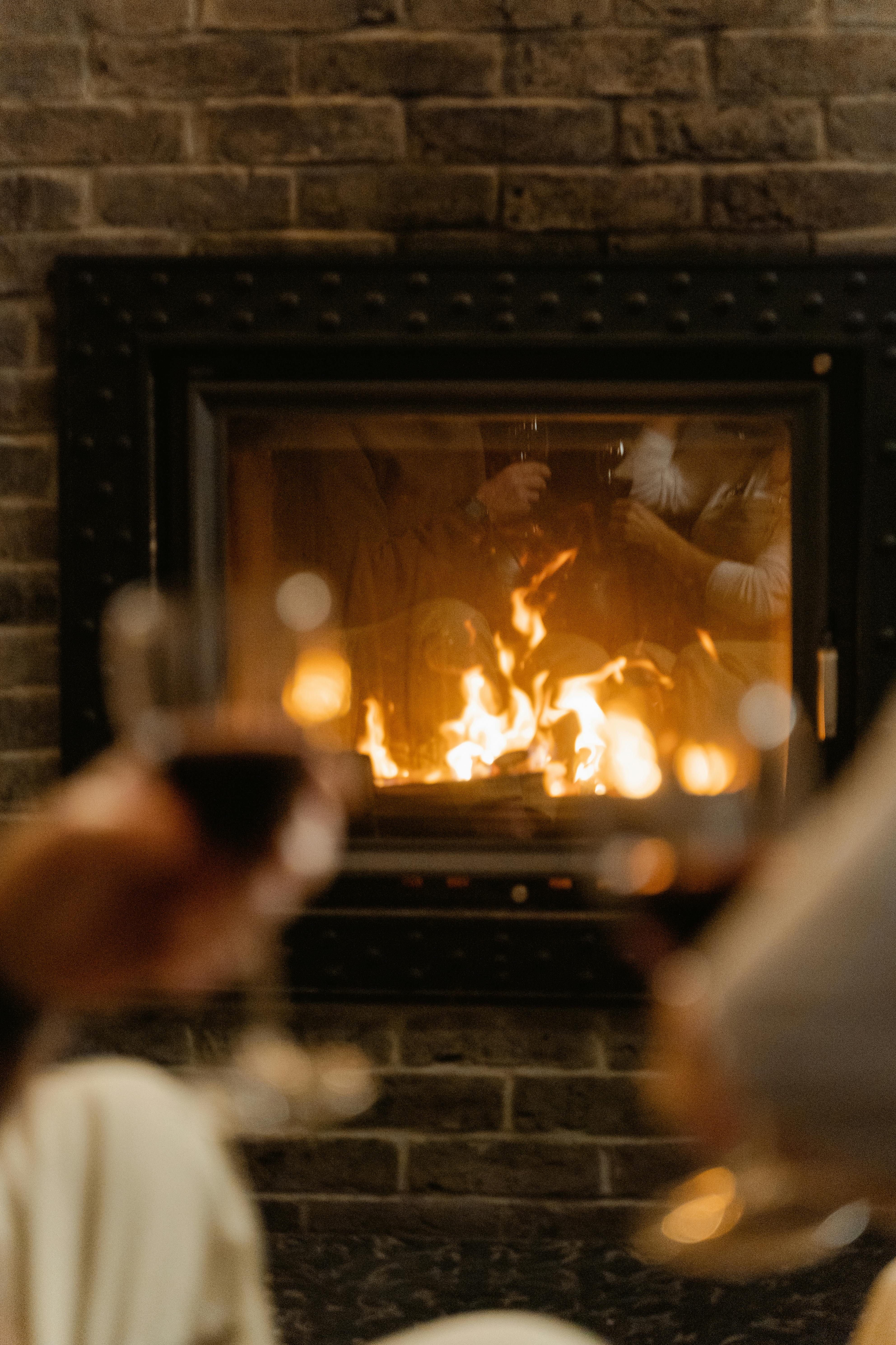 Fire burning in a fireplace | Source: Pexels
