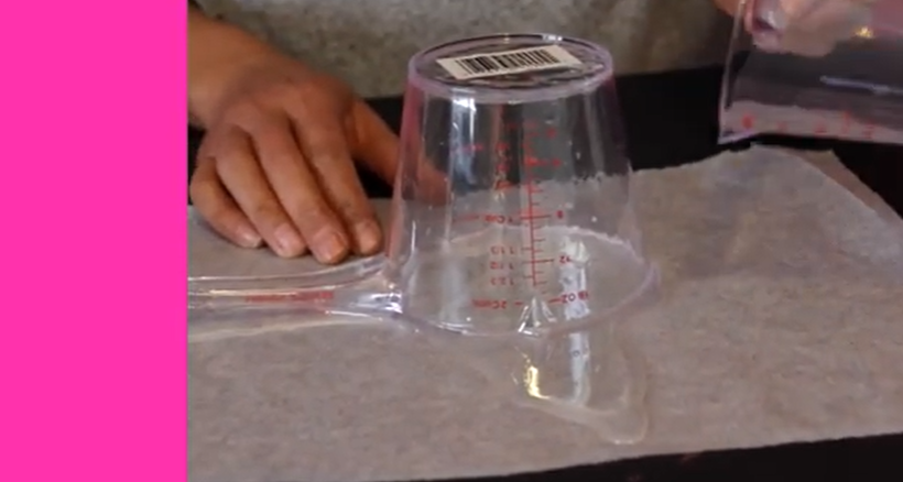 Tip your resin mixing cup upside down and leave it to dry overnight. | Source: YouTube/ArtResin